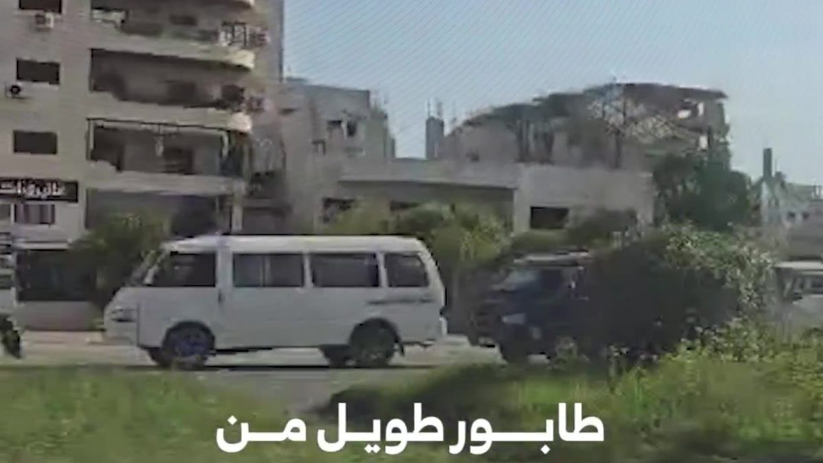 A long line of cars waiting at a fuel station in Latakia, Syria