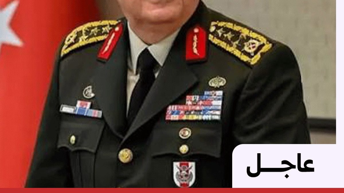 News screen showing a headline about the Turkish defense minister's statement on troops staying in Syria and Iraq